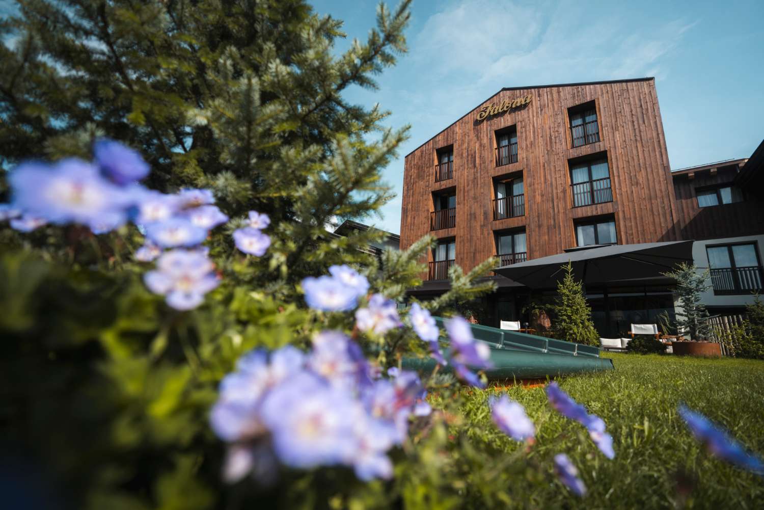 Faloria Mountain Spa Resort exterior in summer, Cortina d'Ampezzo