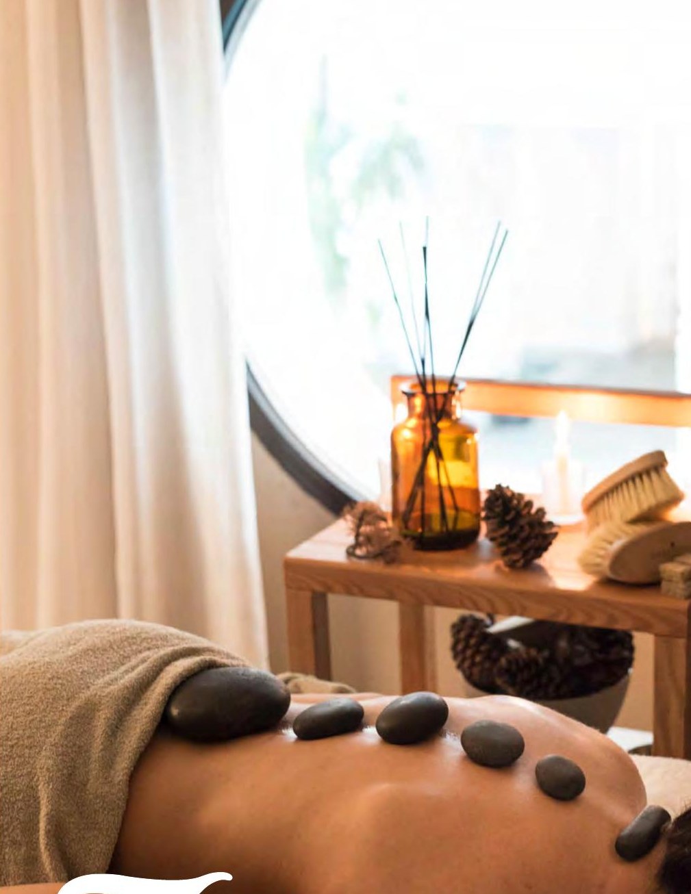 Hot stone massage with warm volcanic stones